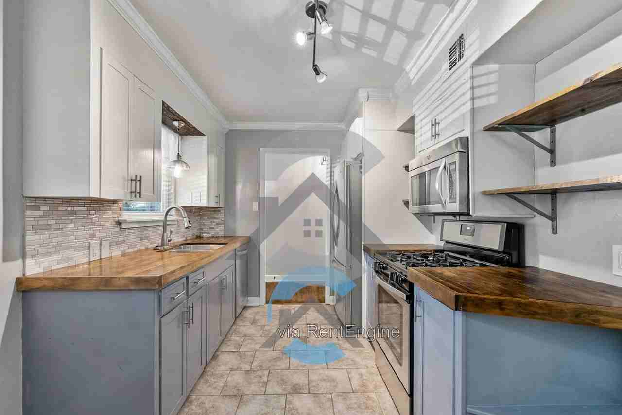 6214 H St - Photo 3 of 14