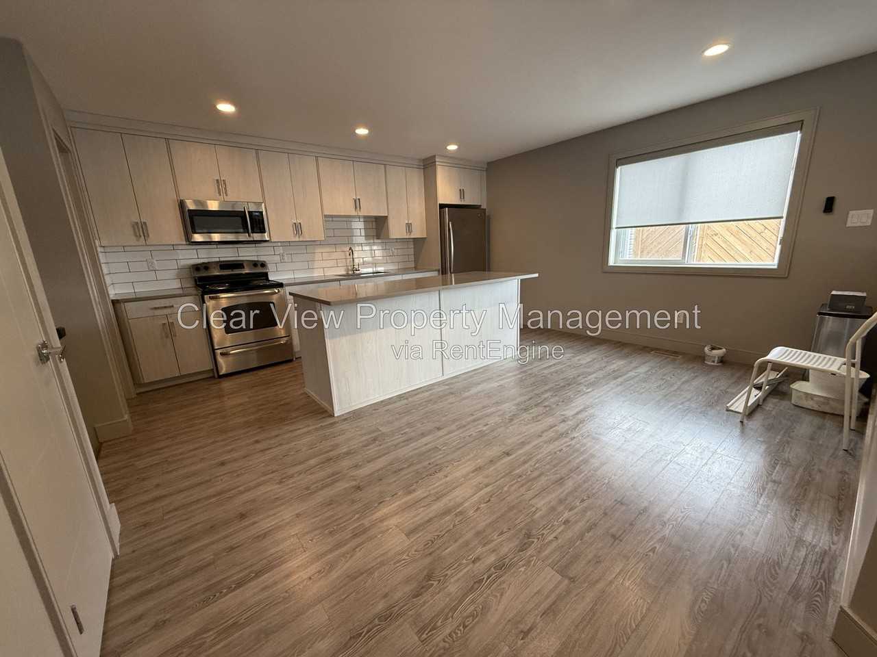 46 Country Meadows Blvd W #4 - Photo 2 of 22