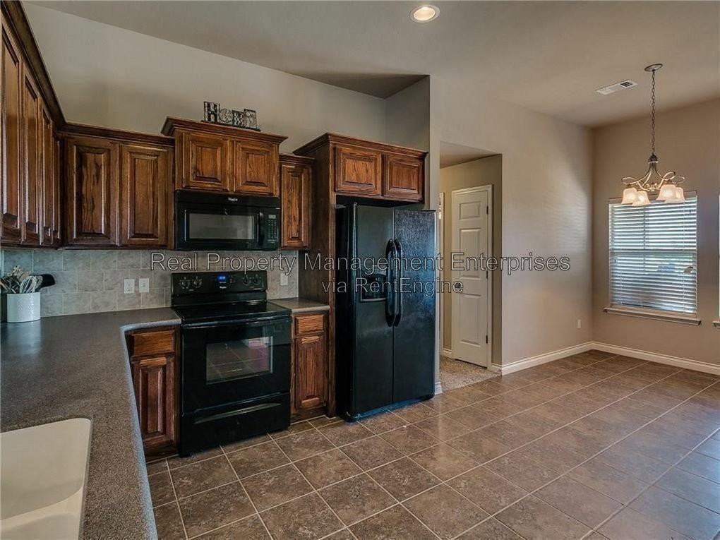 13208 Running Pebble Rd - Photo 6 of 20