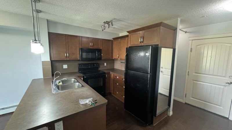 3112, 115 Prestwick Villas SE - Photo 5 of 9