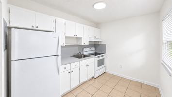 featured image of 115 E 9th St