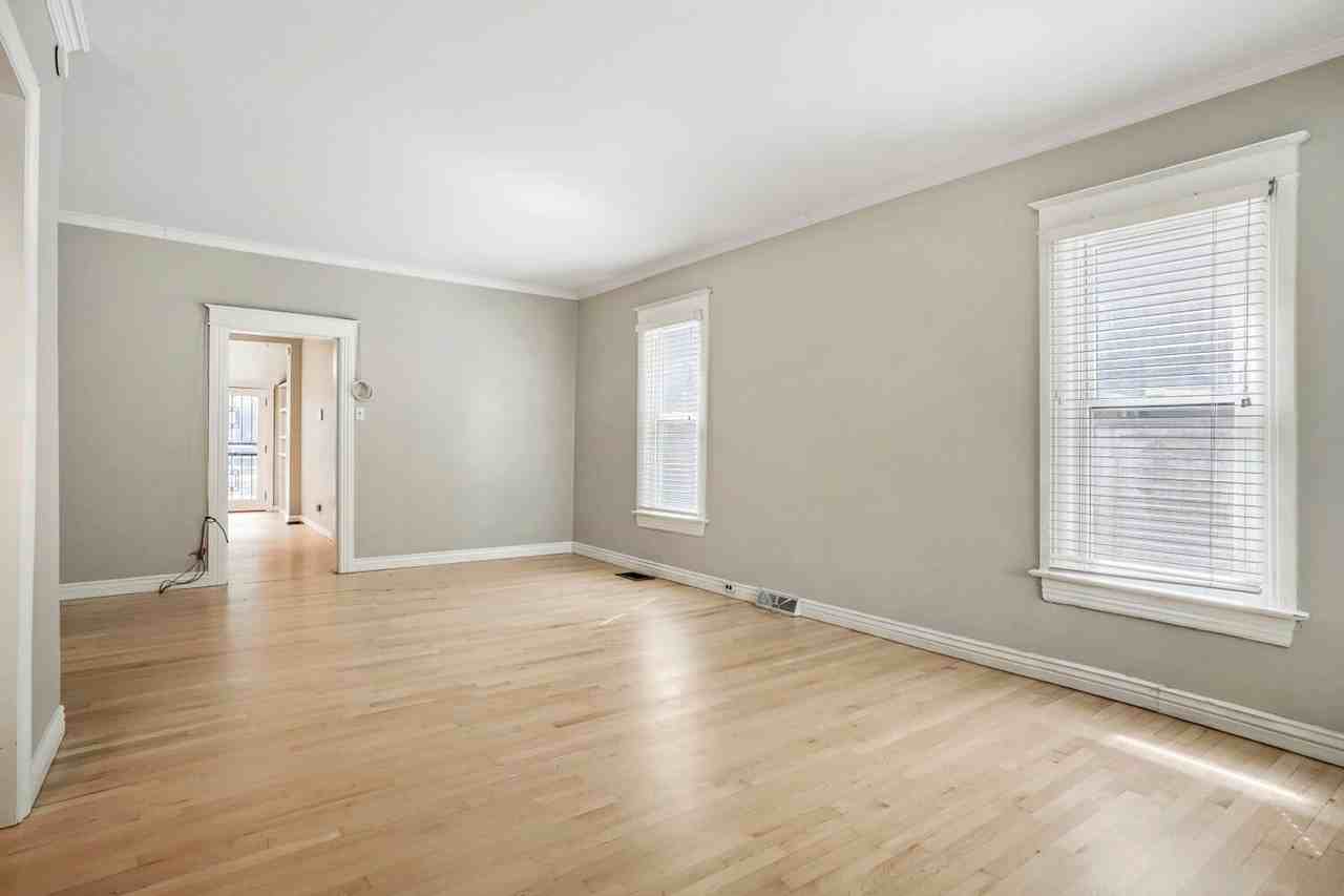 1122 S Ogden St - Photo 3 of 17