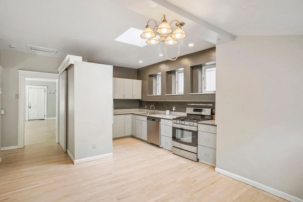 1122 S Ogden St - Photo 7 of 17