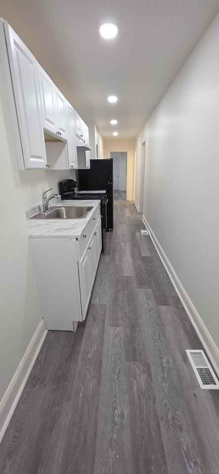 1517 N Fulton Ave - Photo 4 of 12