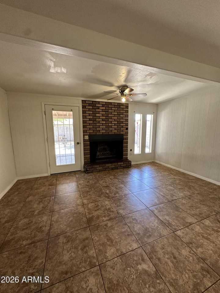5653 W Hatcher Rd - Photo 5 of 18