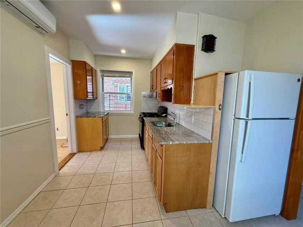 2066 62nd St #1R - Photo 4 of 9