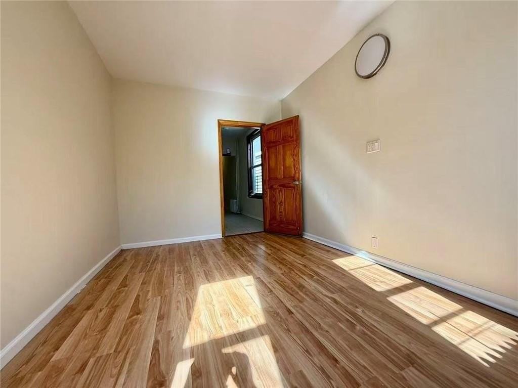 2066 62nd St #1R - Photo 6 of 9