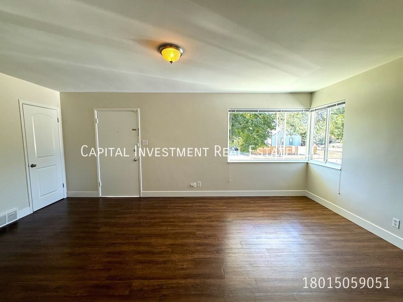 561 E Wilson Ave - Photo 4 of 13