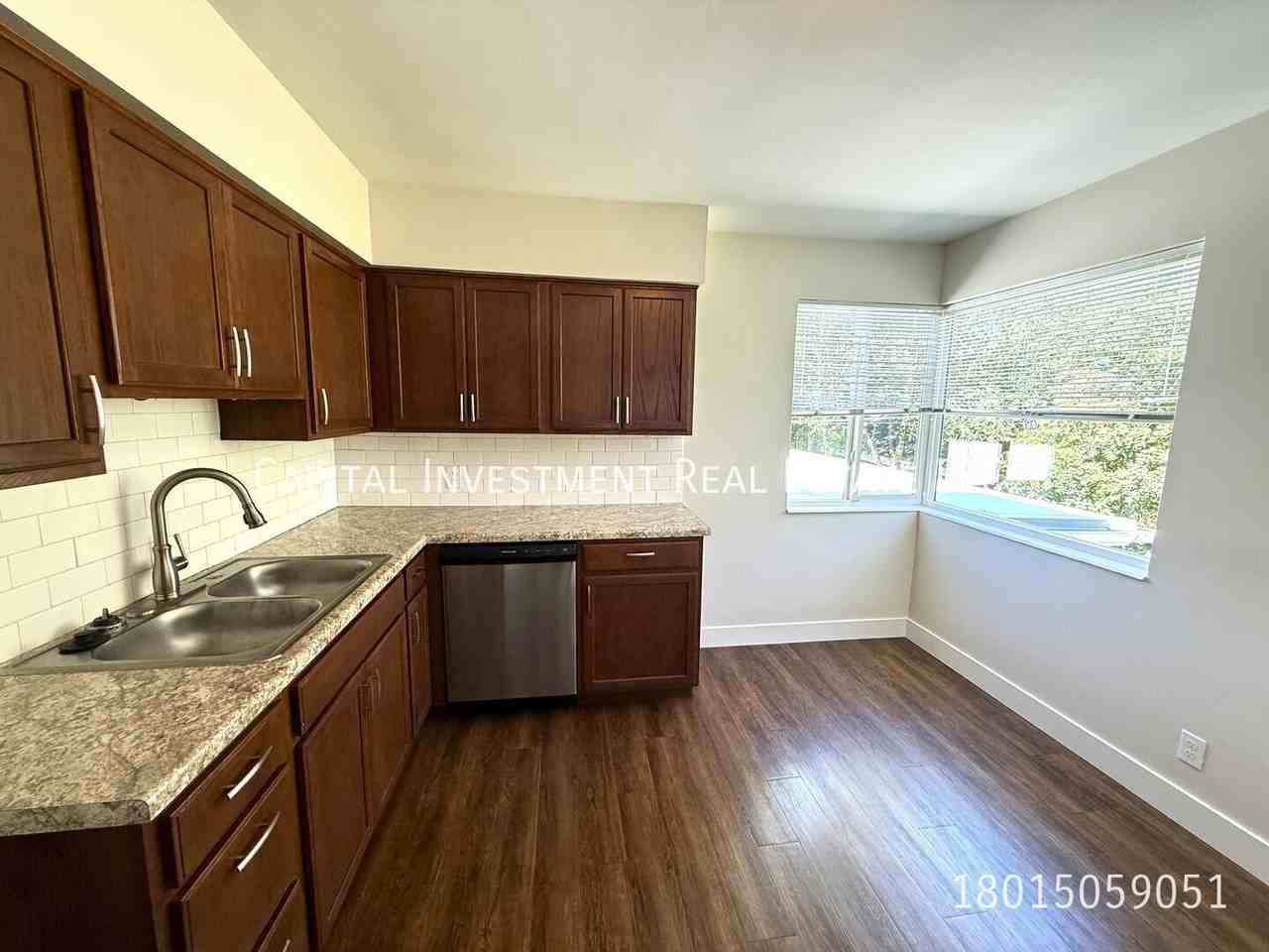 561 E Wilson Ave - Photo 5 of 13