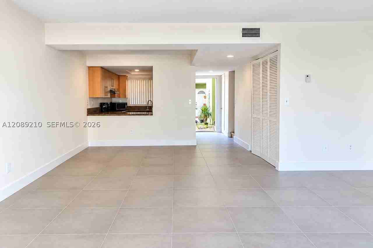 11061 Nw 7th St #103-12 - Photo 2 of 12