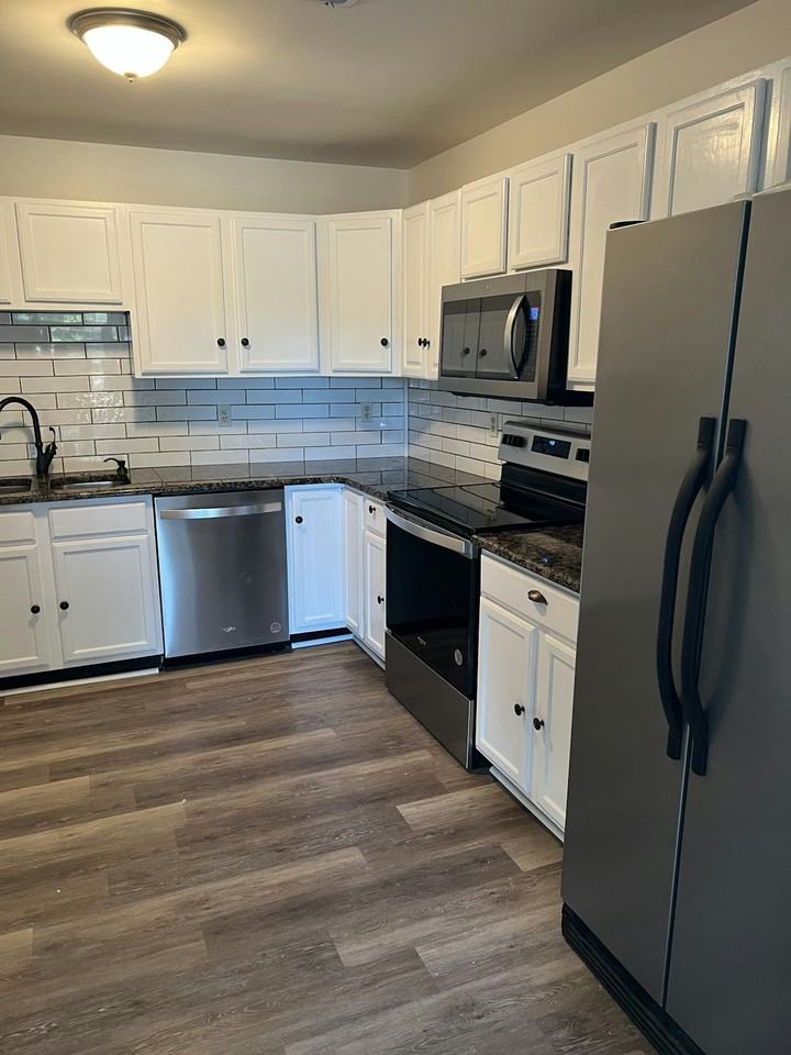5602 Drawbridge Court - Photo 2 of 18