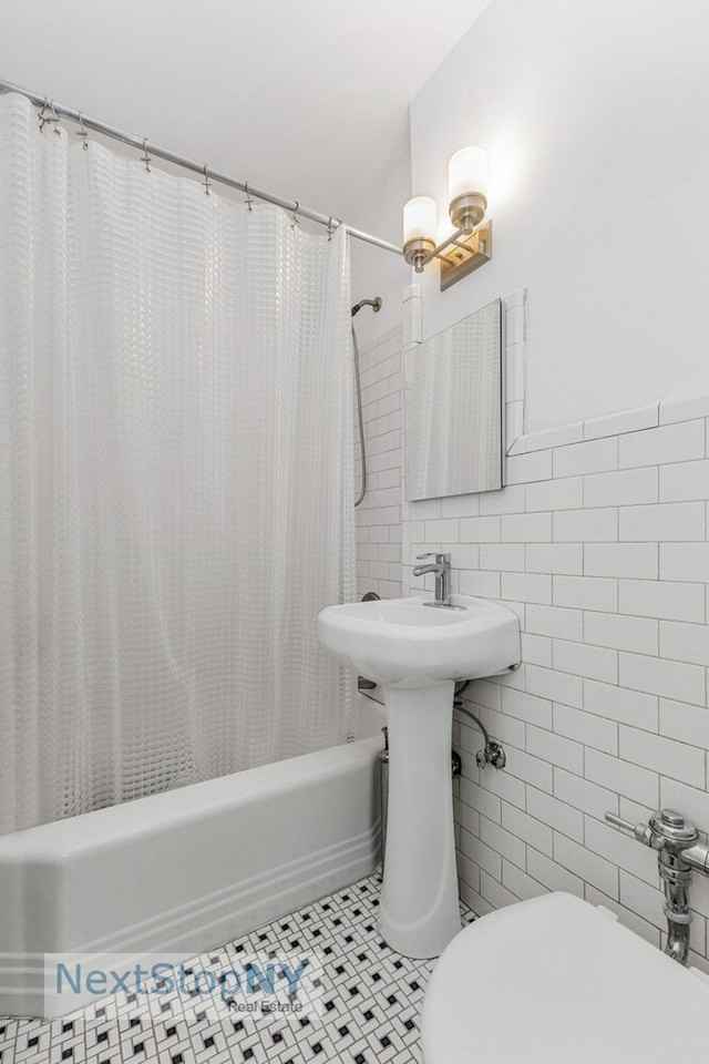 237 E 54th St - Photo 4 of 6