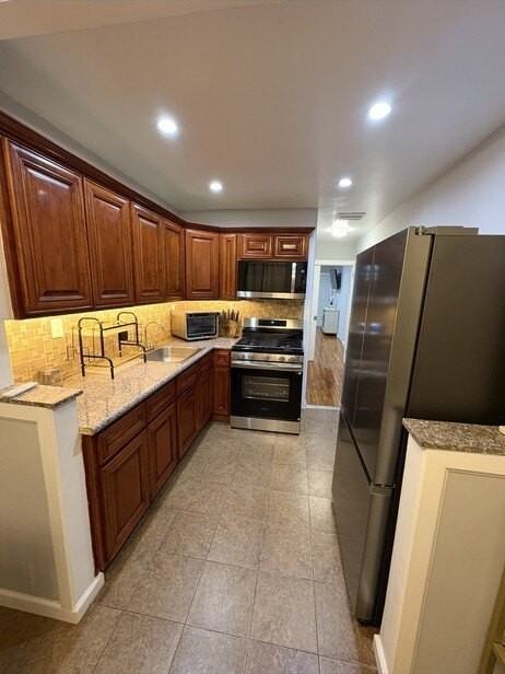 10306 Avenue L - Photo 3 of 6