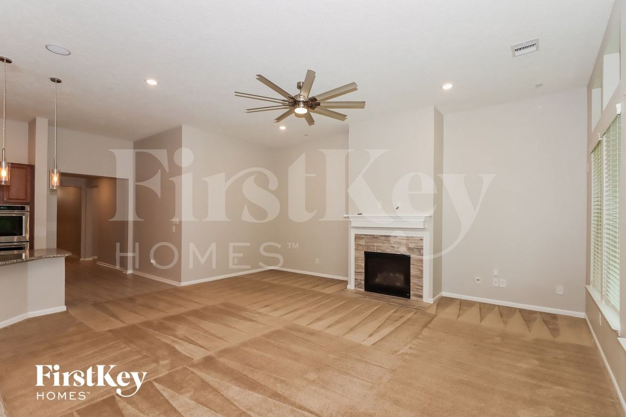 5911 Rivergrove Park Dr - Photo 4 of 16