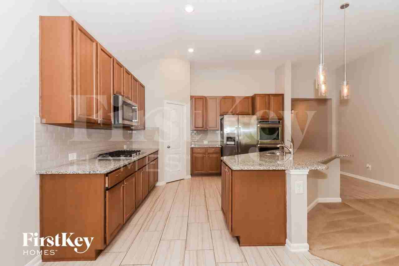 5911 Rivergrove Park Dr - Photo 6 of 16