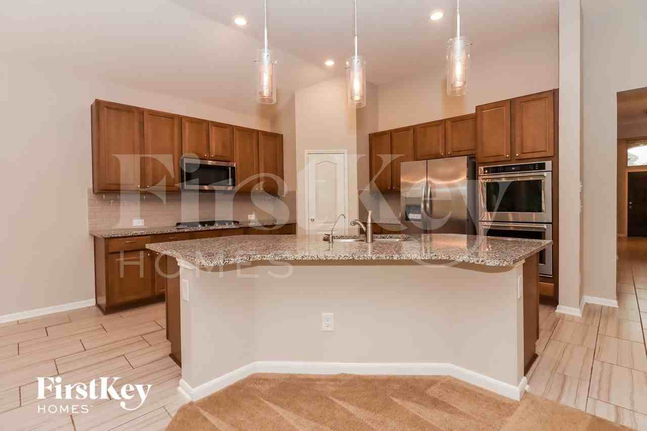 5911 Rivergrove Park Dr - Photo 7 of 16