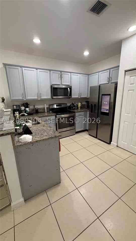 8917 Nw 102nd Ct #0 - Photo 7 of 12