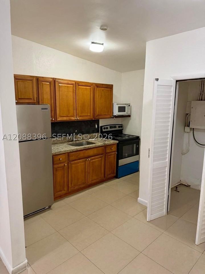 9945 Nw 22nd Ave #1 - Photo 5 of 28