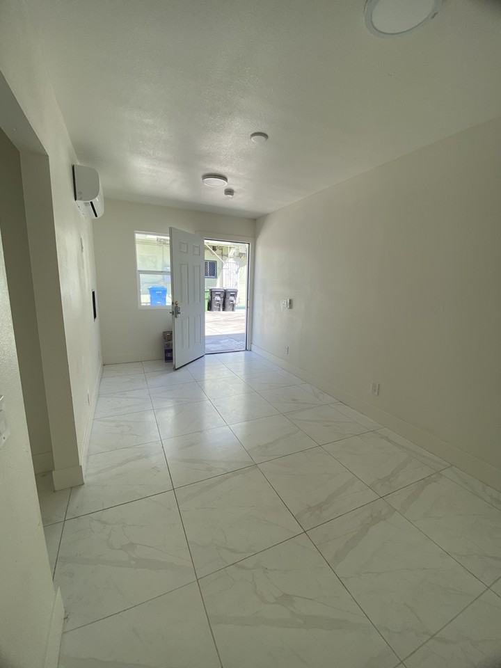 1580 W 29th St #1 - Photo 2 of 9