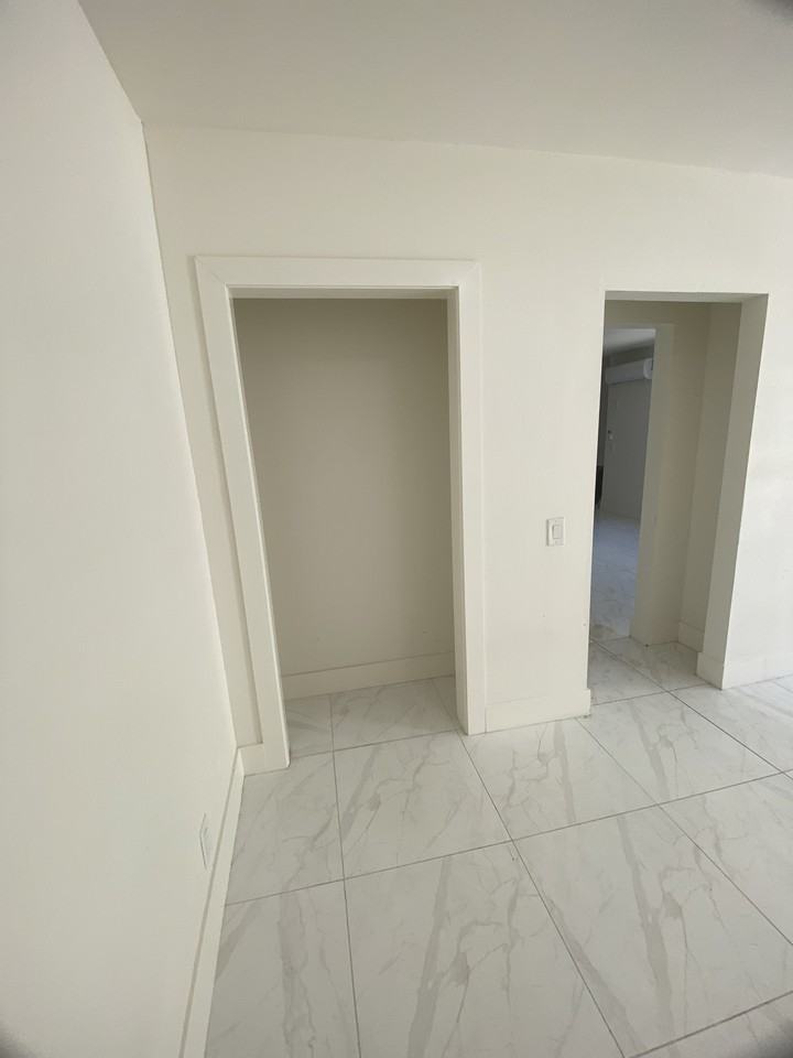 1580 W 29th St #1 - Photo 3 of 9