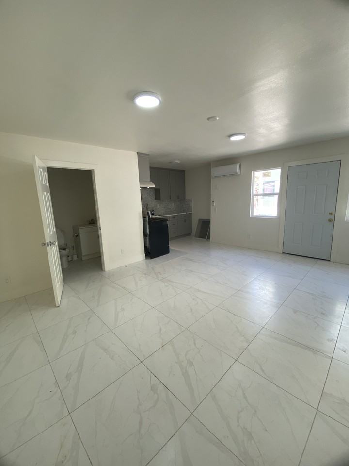 1580 W 29th St #1 - Photo 4 of 9
