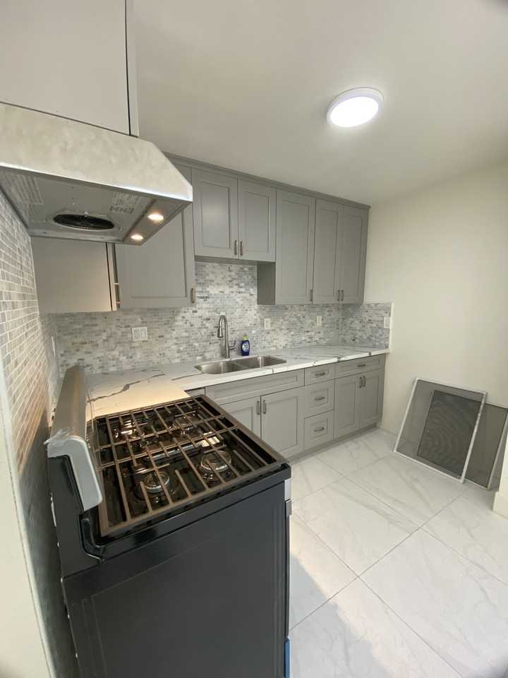 1580 W 29th St #1 - Photo 5 of 9