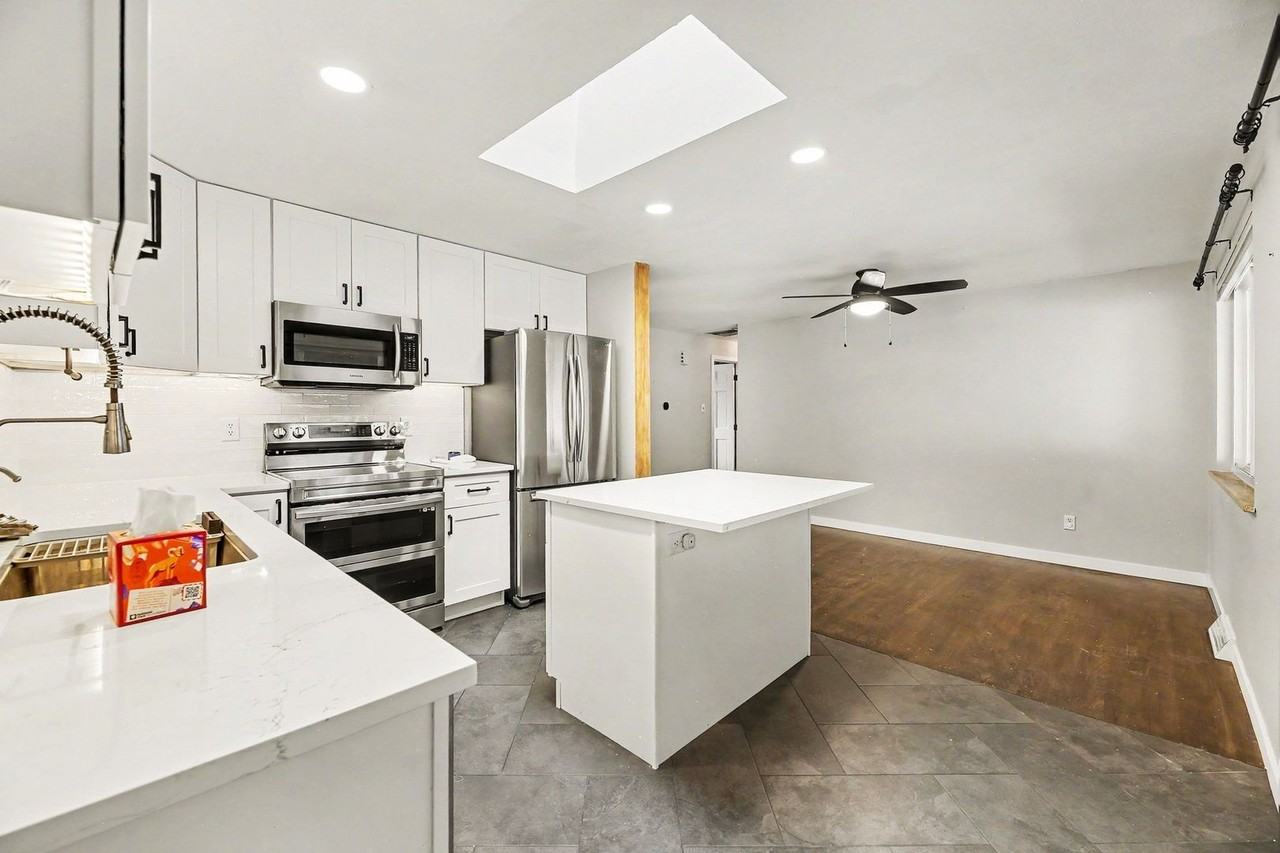 6762 Harlan St - Photo 6 of 31
