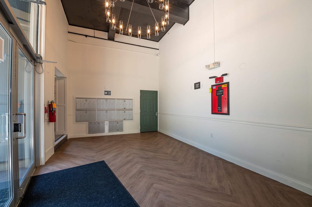 Beautifully Renovated Overiszed Loft Apts with Parking near Downtown! - Photo 3 of 5