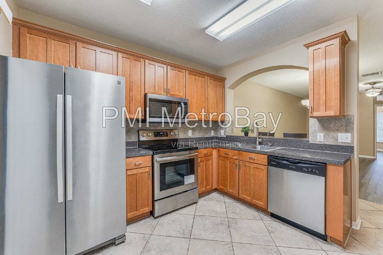 15706 Fishhawk Falls Dr - Photo 2 of 50