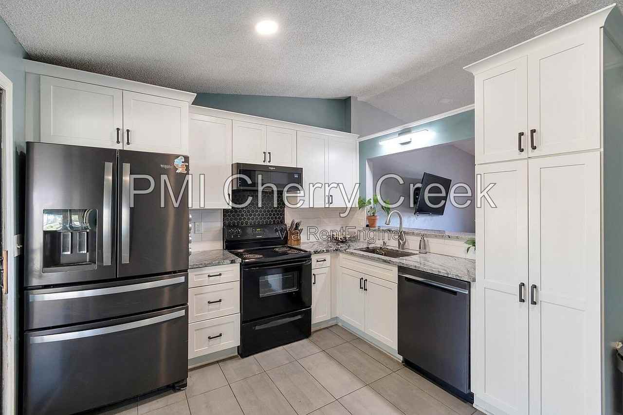 4891 S Holland Ct - Photo 3 of 10