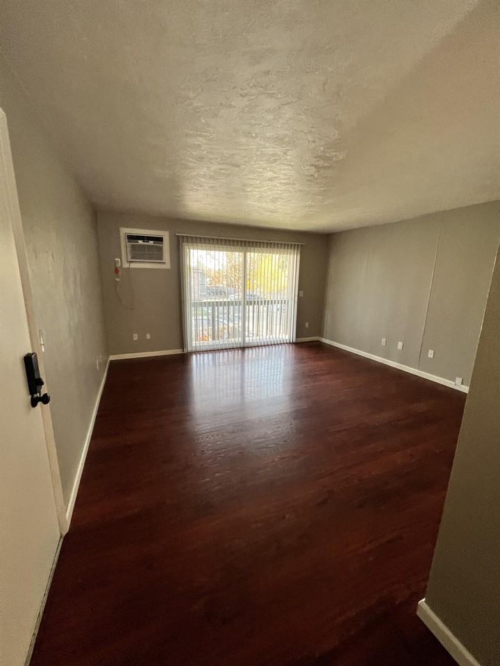Brass Lamp Apartments - Photo 2 of 49