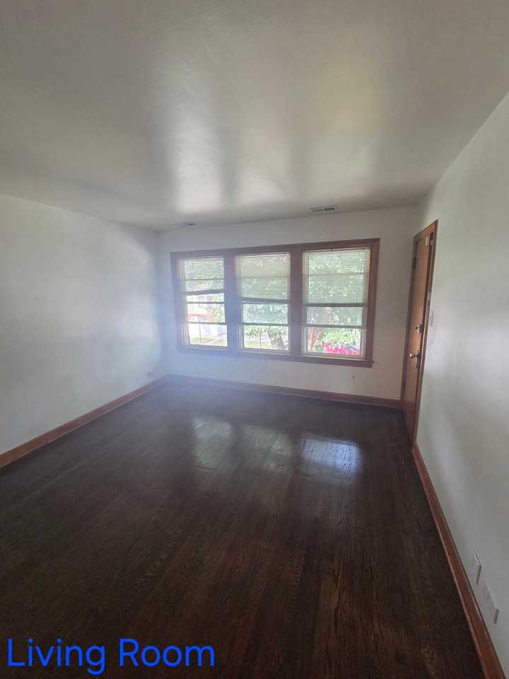 8635 S Colfax Ave - Photo 4 of 20