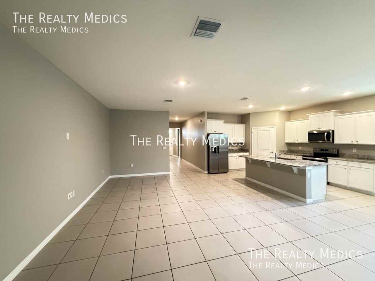 8053 Penrose Pl - Photo 7 of 30
