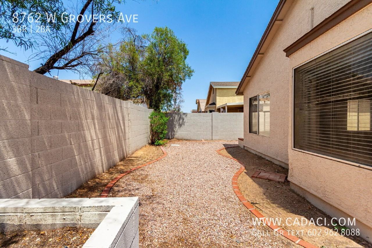 8762 W Grovers Ave - Photo 4 of 42