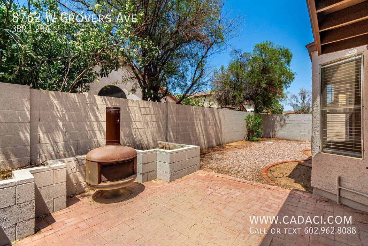 8762 W Grovers Ave - Photo 6 of 42