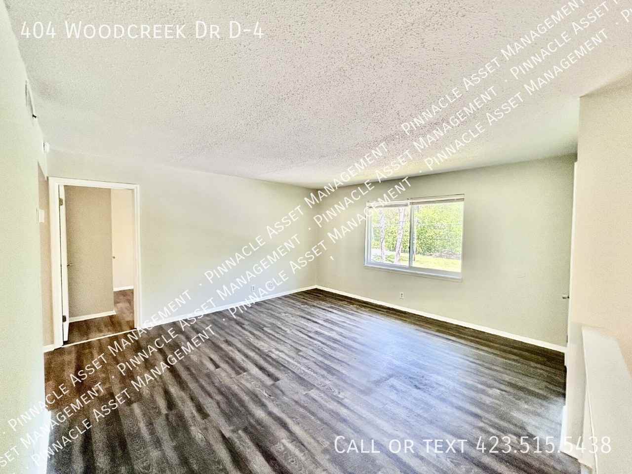 404 Woodcreek Dr - Photo 3 of 12