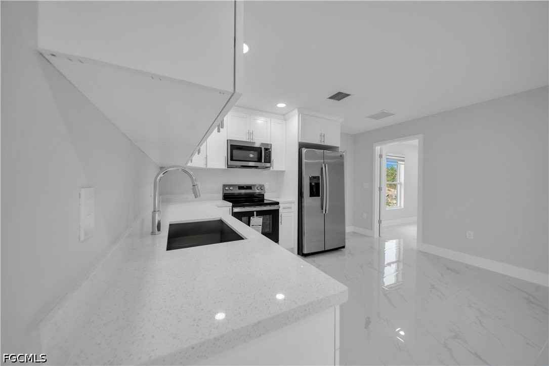 3819 3rd St W - Photo 3 of 8