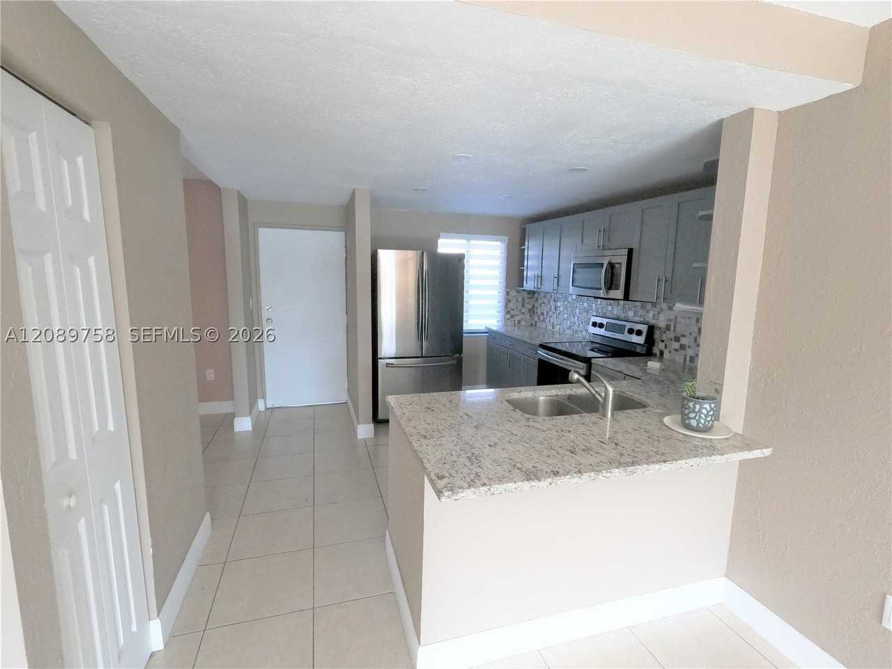 9911 W Okeechobee Rd #1-101 - Photo 4 of 18