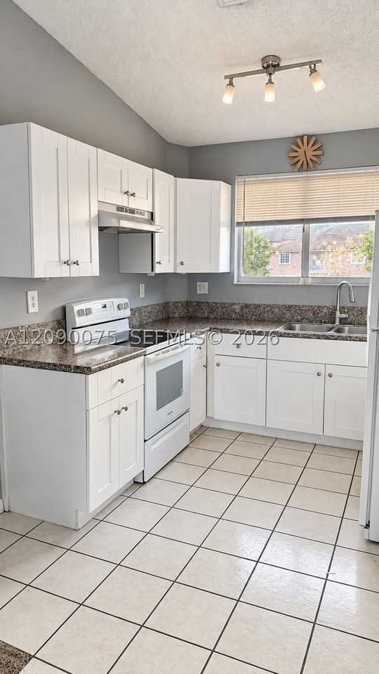 5800 W 18th Ln #205 - Photo 2 of 12