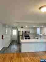 featured image of 12 Grunauer Ave #A
