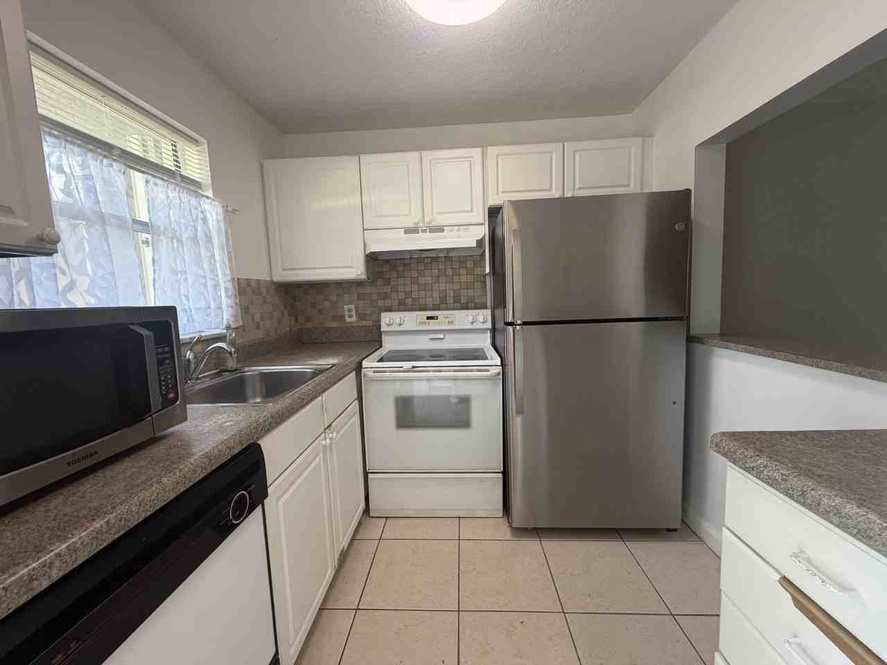 9915 Sandalfoot Blvd #410 - Photo 4 of 25