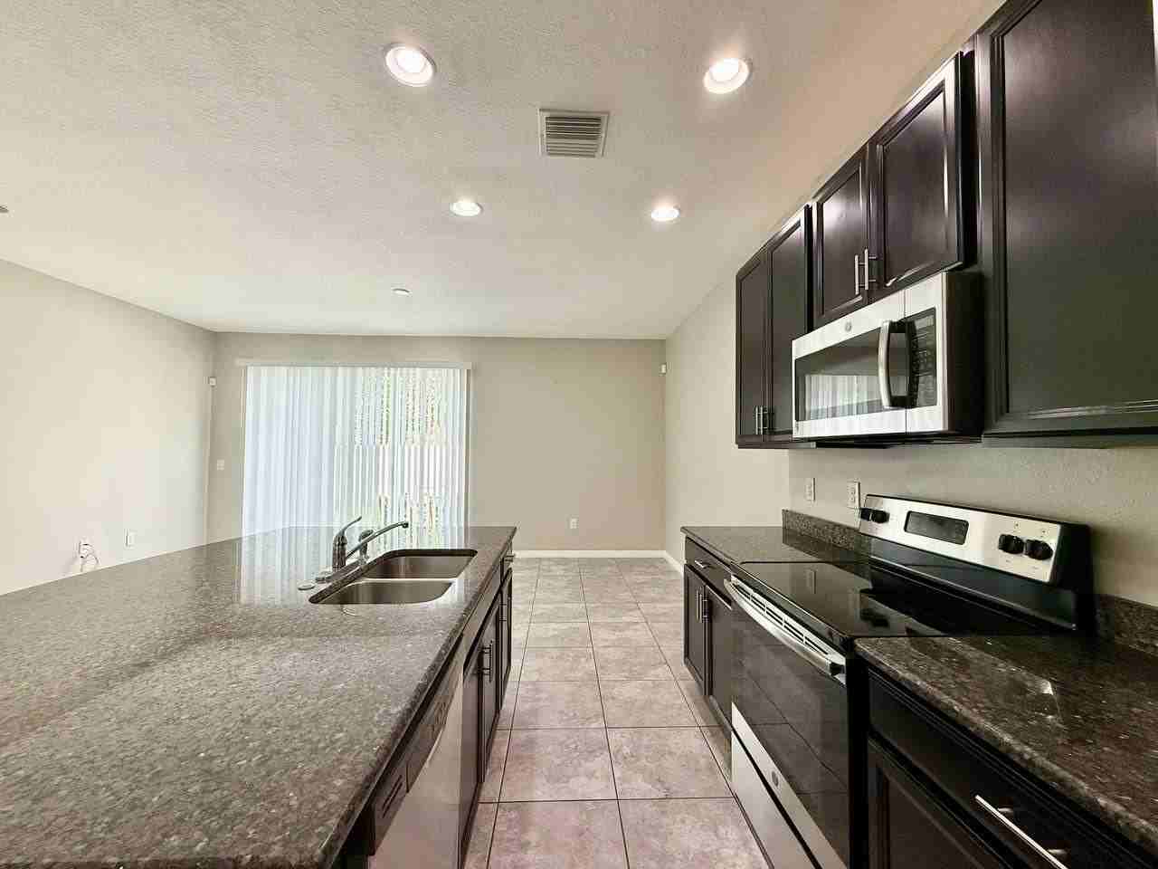 7123 Summer Holly Pl - Photo 6 of 25