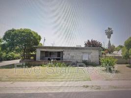 featured image of 112 E 13th St