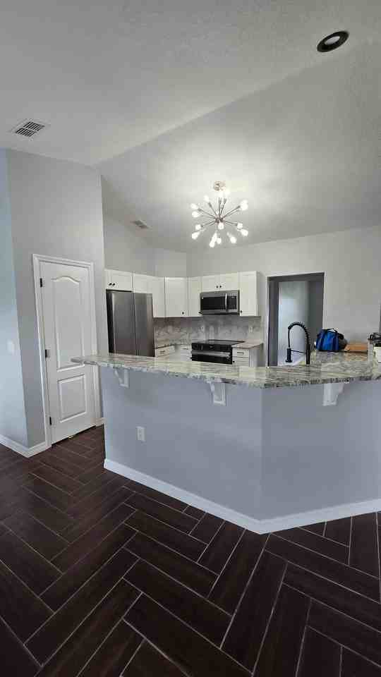 7704 Canterbury Cir - Photo 3 of 23