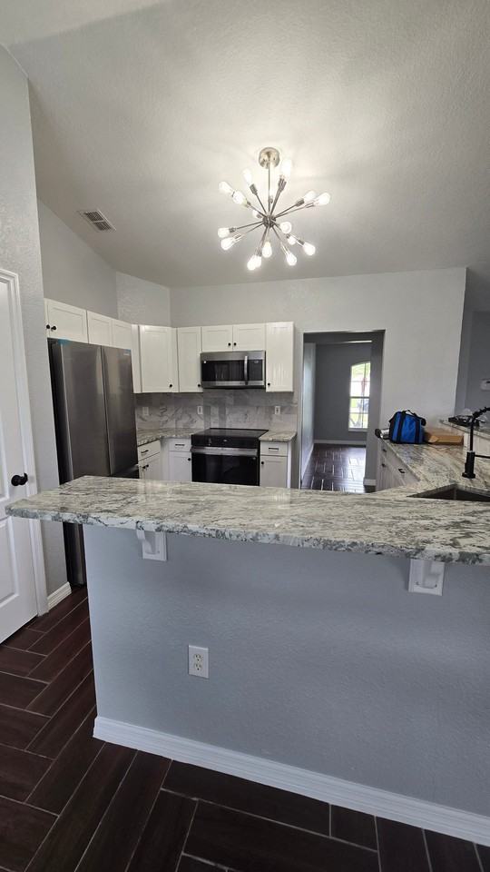 7704 Canterbury Cir - Photo 4 of 23