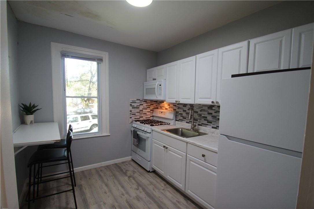 2366 Spencerport Rd - Photo 5 of 17