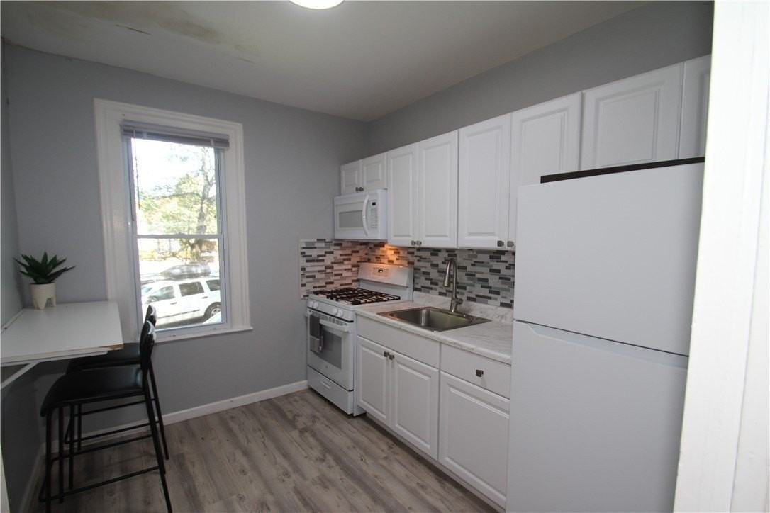 2366 Spencerport Rd - Photo 6 of 17