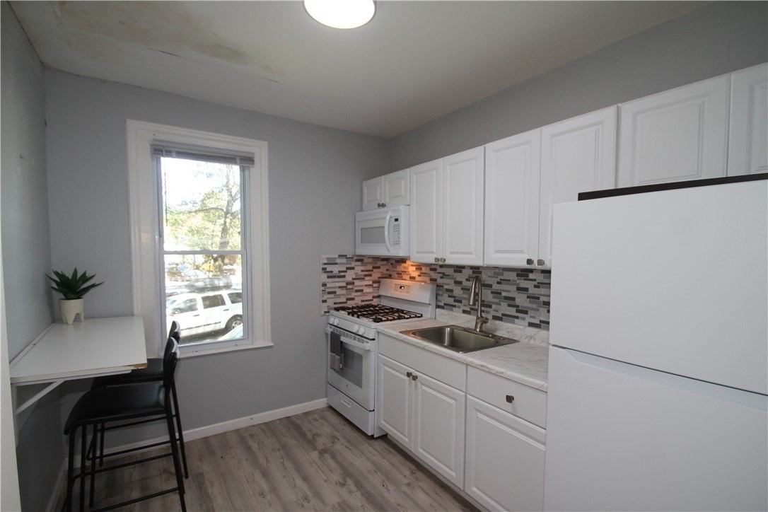2366 Spencerport Rd - Photo 7 of 17