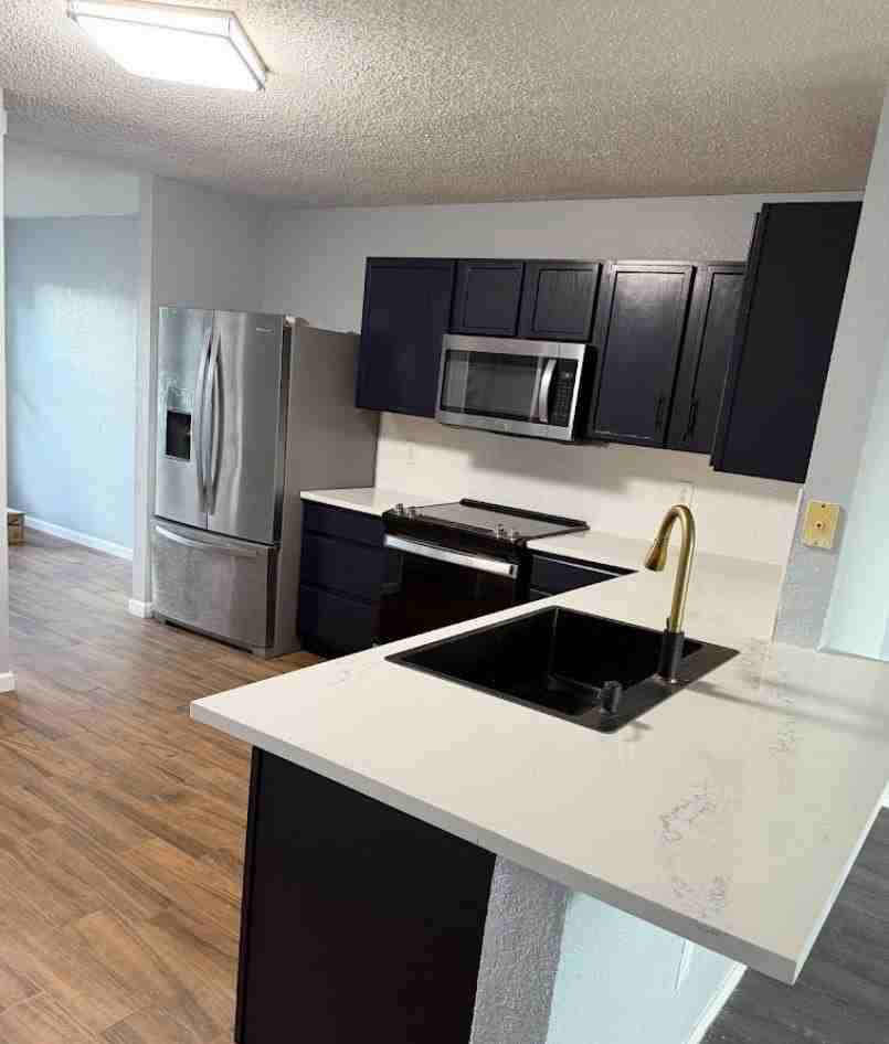 1705 Pin Oak Trl - Photo 3 of 3