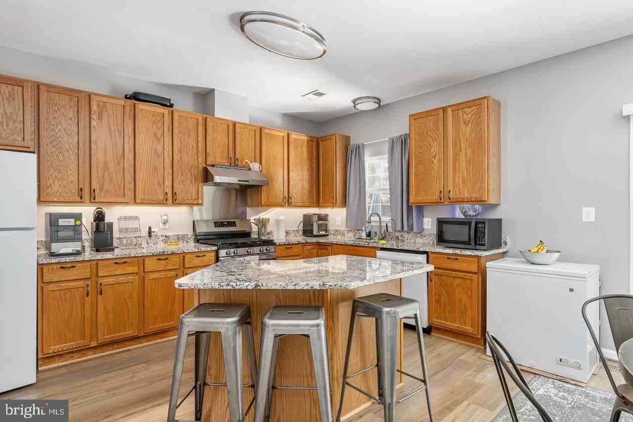 9626 Eaton Woods Pl - Photo 3 of 50